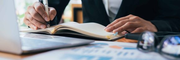 Businesswoman analyse investment marketing data.